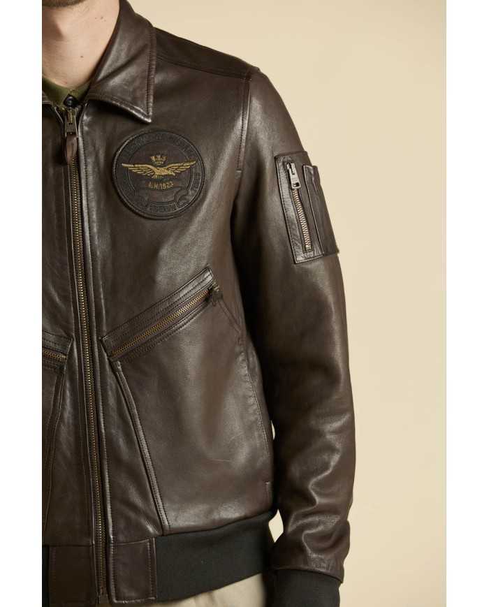 Veste en cuir avec écussons et imprimés