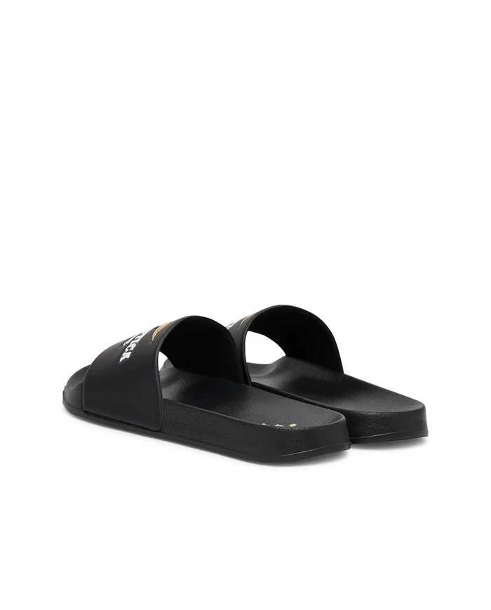 Mule en caoutchouc avec bride logotée